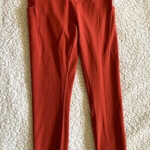 Women's Lululemon terracotta color leggings, size 6